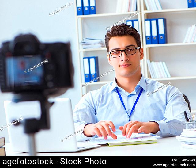 Business blogger doing webcast for his subscribers