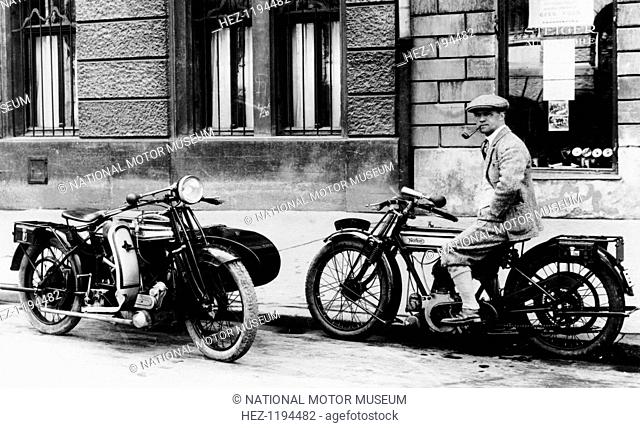 A man on a Norton bike, Model 16H 490cc SV, 1924. To the left of him is a Big 4 combination bike, possibly a Model 16H, 633cc