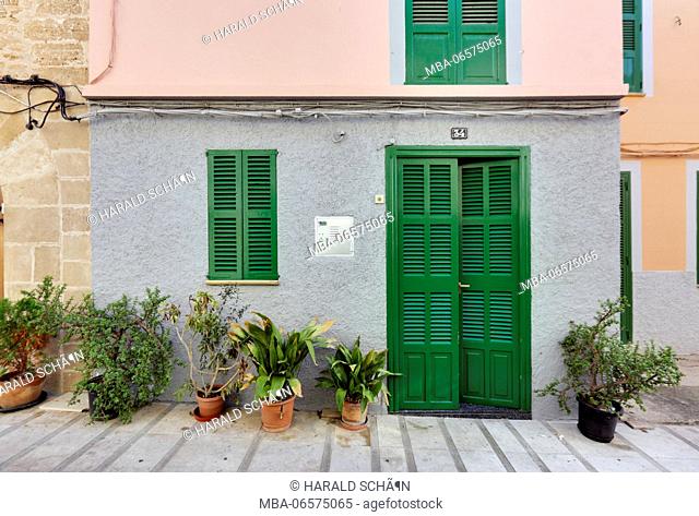 Spain, Majorca, AlcÃºdia, house, side of the street, number 34, facade, door, window, shutters closed, potted plants, pedestrian area