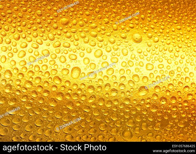 Abstract background of golden drops of water
