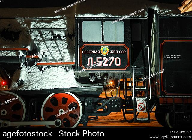 RUSSIA, YAROSLAVL REGION - DECEMBER 15, 2023: An L-5270 retro steam locomotive is seen at a train station in the town of Rybinsk