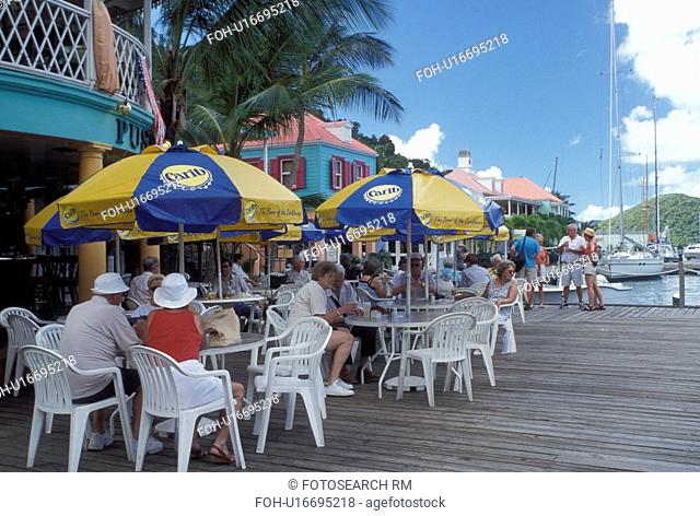 outdoor cafT, Caribbean, Tortola, West End, British Virgin Islands, BVI, Sopers Hole, Pusser's Landing on the waterfront of Frenchman's Cay on the island of...