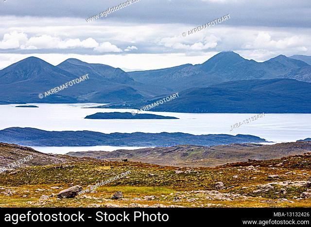 View from Bealach na Ba Viewpoint of the silhouette of the Isle of Skye mountains