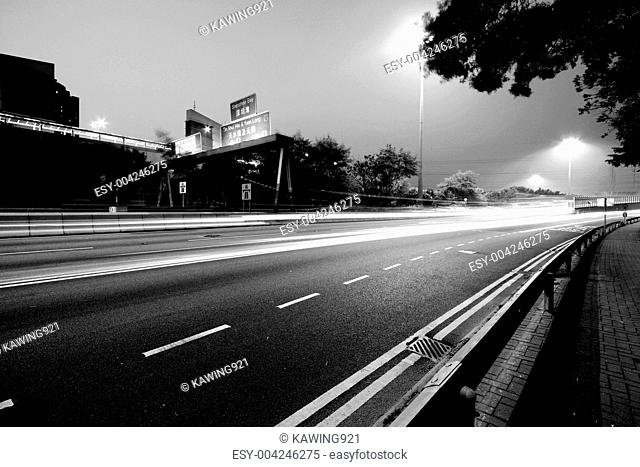 Traffic in modern city in black and white tone