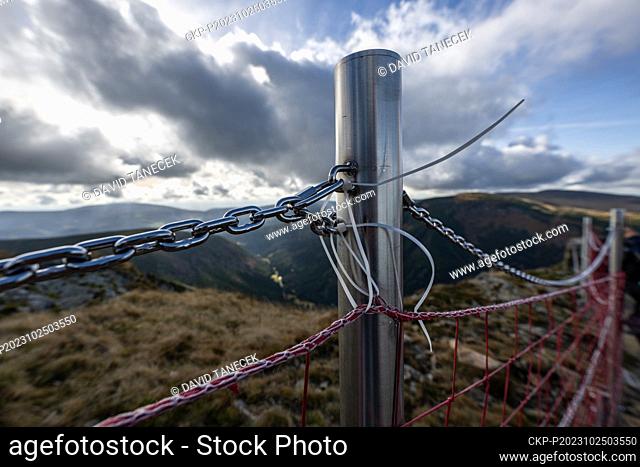 Detail of the new stainless steel barrier around the visitor area on the top of Snezka Mountain, Krkonose (Giant Mountains), Czech Republic, October 23, 2023