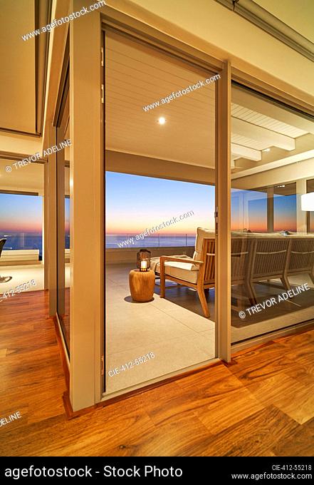 Scenic sunset ocean view from luxury home showcase balcony