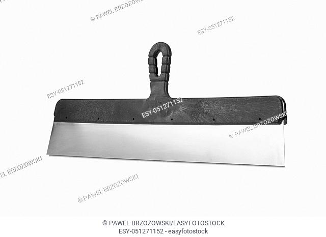 Finishing spatula on white background. Handle coating knife on white background. Stainless steel spatula with plastic handle