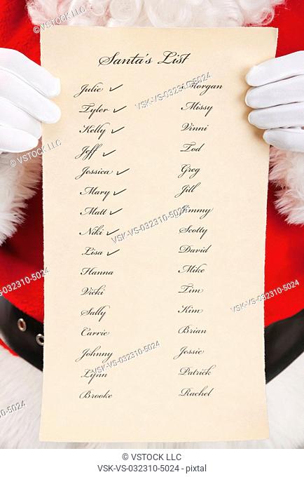 Santa clause holding Christmas list