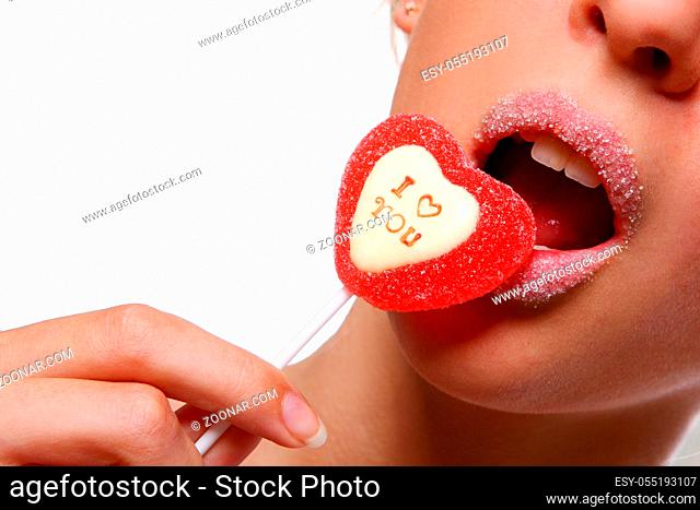 a beautiful attractive woman with lollipop