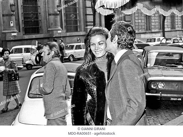 The Egyptian actor Omar Sharif walking arm in arm with the Brazilian actress Florinda Bolkan on a street after a press conference for the launching of the movie...