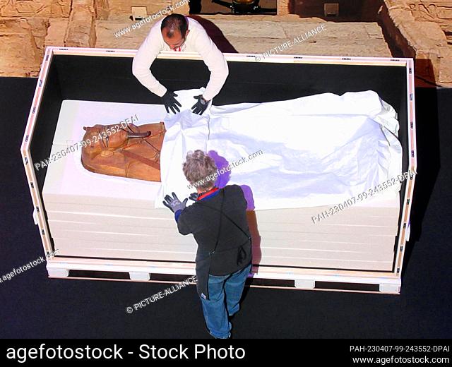 PRODUCTION - 03 April 2023, France, Paris: The sarcophagus of Ramses II is taken out of a transport crate in the Grande Halle de la Villette