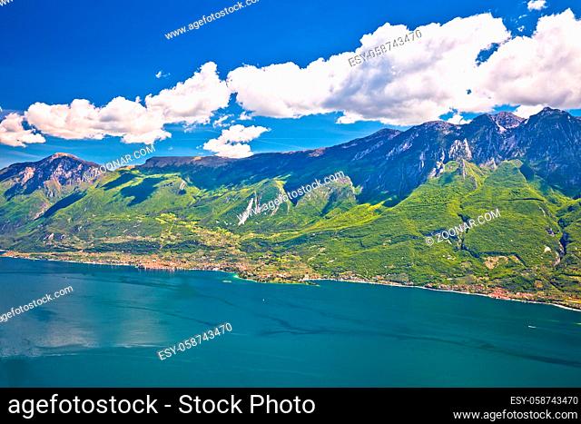 Lago di Garda and high mountain cliffs above Malcesine view, landscapes of Italy