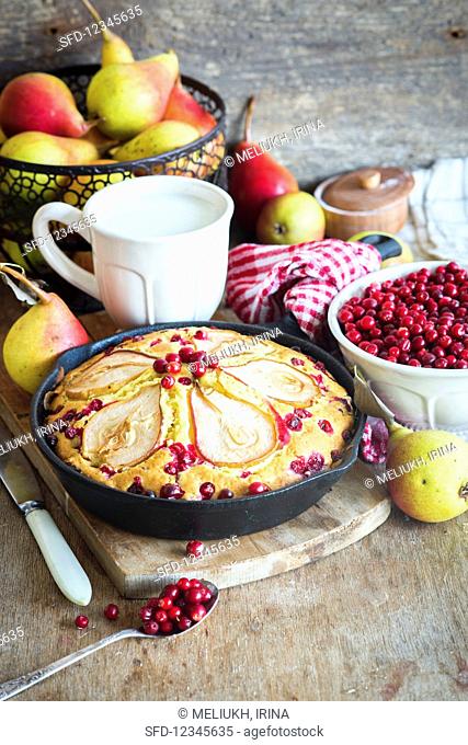 Autumnal pear and cranberry cake