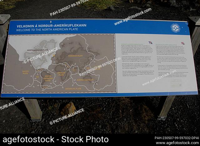 15 August 2022, Iceland, Halbinsel Reykjanes: An information board stands at the Midlina Bridge, which spans the divide between the Eurasian and North American...