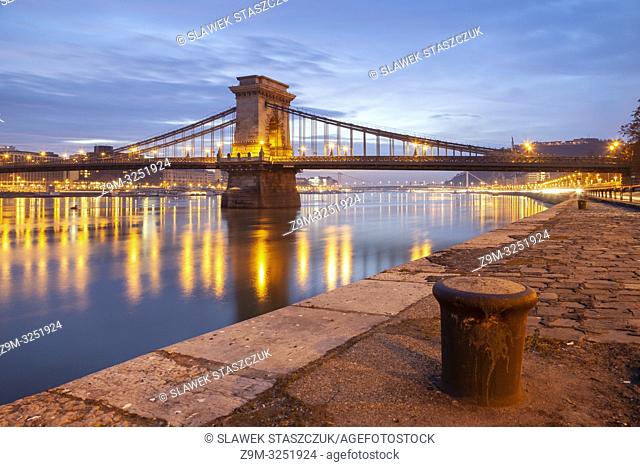 Dawn at the Chain Bridge across Danube river in Budapest, Hungary