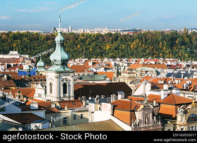 Famous scene, cityscape of Prague, Czech Republic. Tower Church of St. Salvator. Autumn sunny day