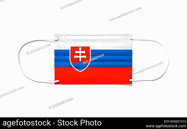 Flag of Slovakia on a disposable surgical mask. White background isolated