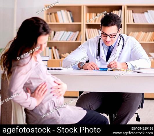 The pregnant woman visiting doctor for consultation