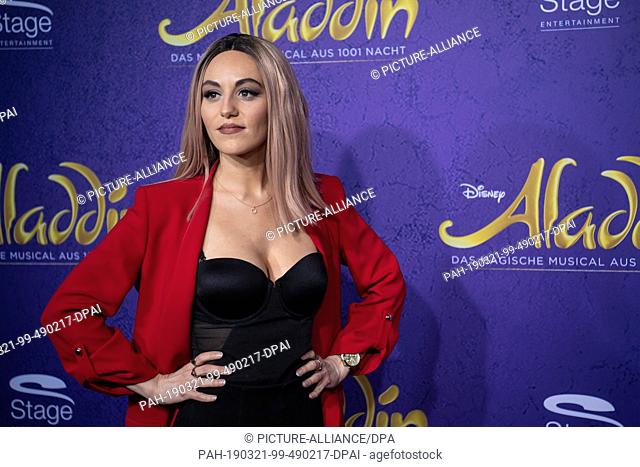21 March 2019, Baden-Wuerttemberg, Stuttgart: Jenny Marsala, singer, comes over the red carpet to the premiere of the musical ""Aladdin""