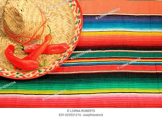 striped poncho serape sombrero fiesta background with copy space background