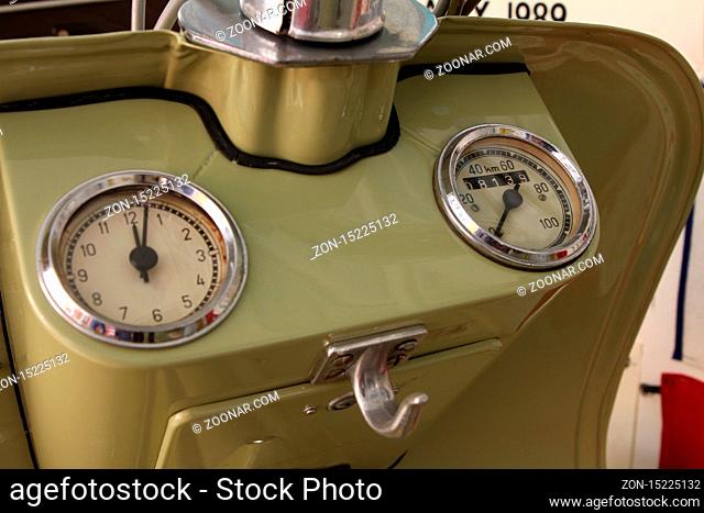Old biker helmet and goggles. close up of dashboards