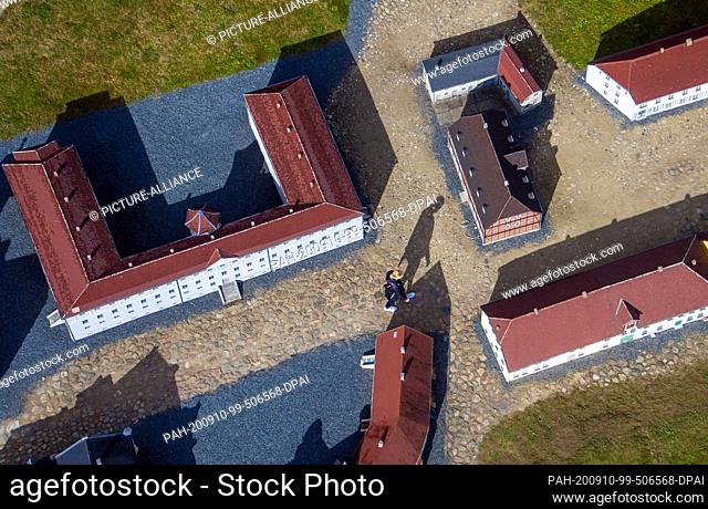 10 September 2020, Mecklenburg-Western Pomerania, Bützow: Visitors are on the move in the miniature city of Bützow. (Aerial view with a drone) Since 1995 the...