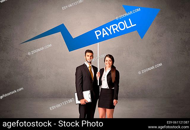 Young business person in casual holding road sign with PAYROLL inscription, business direction concept