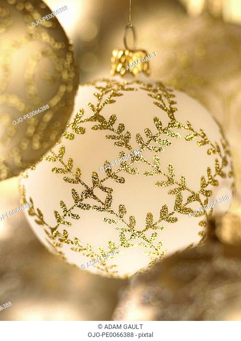 Close up of gold Christmas ornaments