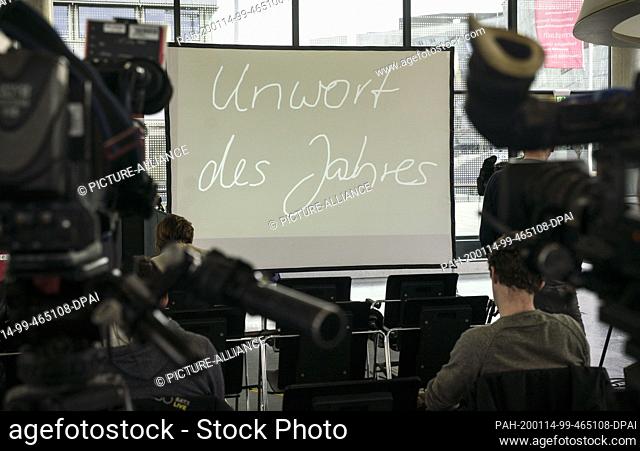 14 January 2020, Hessen, Darmstadt: The ""Word of the Year"" will be shown on a screen at a press conference prior to the announcement of the ""Word of the...