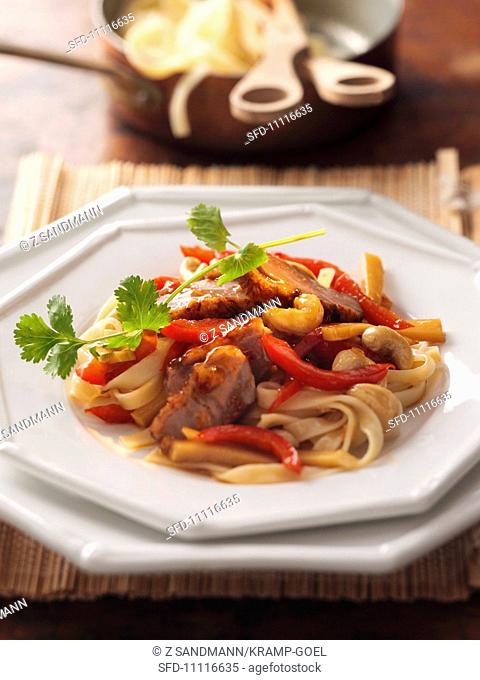 Tagliatelle with duck and peppers Asia