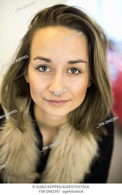 Tilburg, Netherlands. Portrait attractive, Polish immigrant girl