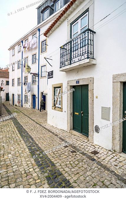 Narrow streets around Castelo Sao Jorge. Alfama. Lisboa. Portugal. Europe