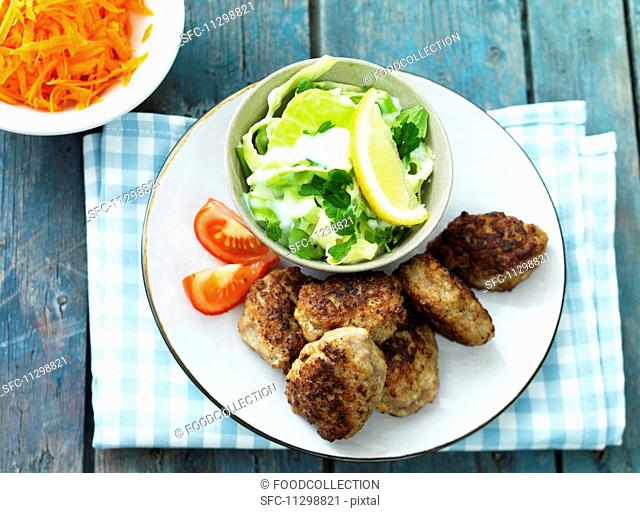 Meat patties with a carrot and cabbage salad