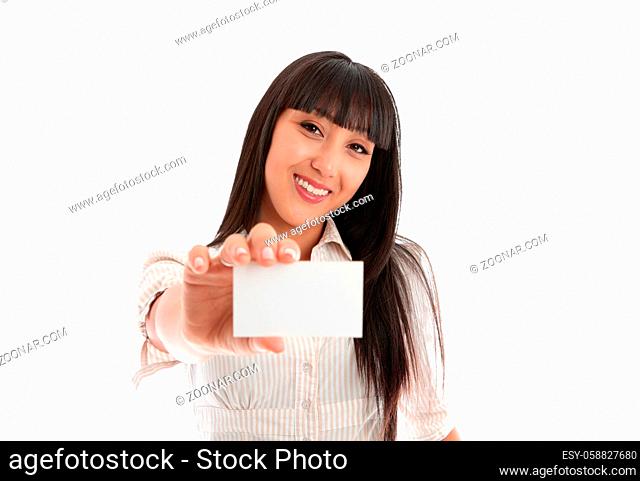 A beautiful smiling young woman holding a businesscard, club card, id card, licence or other. Blank.  White background