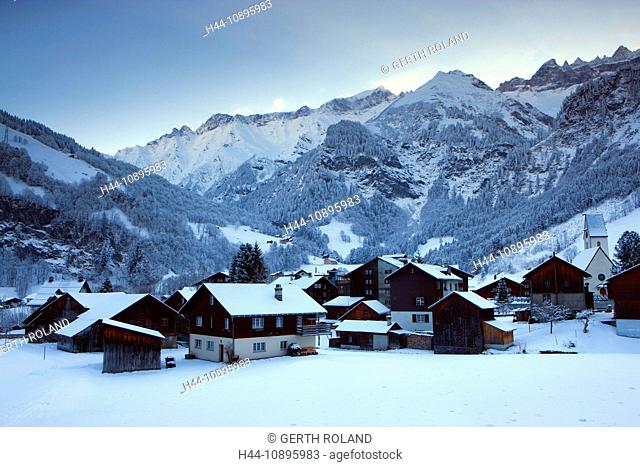 Elm, Switzerland, Europe, canton Glarus, village, houses, homes, church, winter, snow, mountains