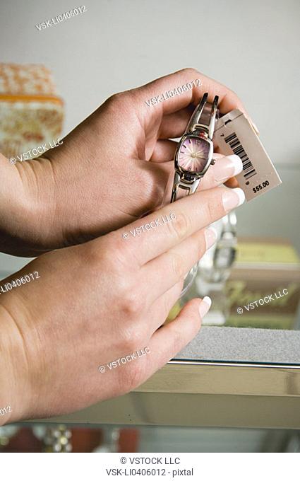 Woman shopping for a watch