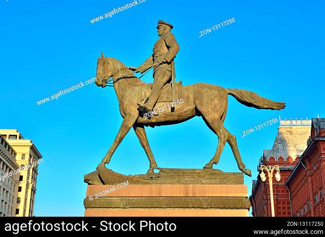Moscow, Russia - November 16, 2018: Equestrian monument to Marshal of the Soviet Union Georgy Zhukov on the background of the Historical Museum
