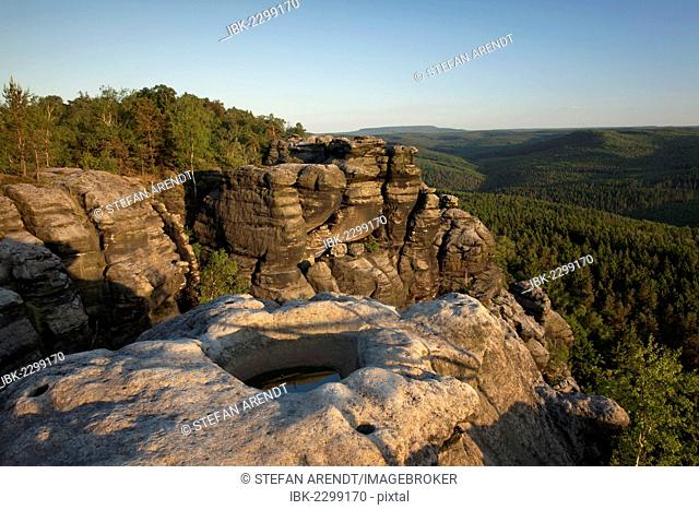 Evening mood from Pfaffenstein table mountain with Opferkessel stone basin in the Elbe Sandstone Mountains, Saxony, Germany, Europe