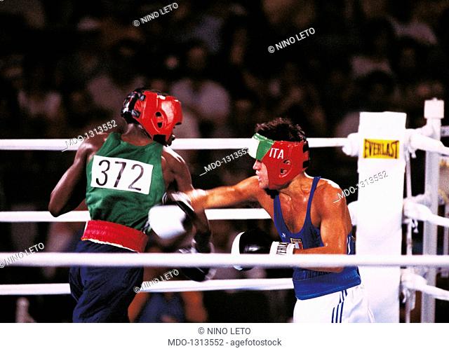 Maurizio Stecca and Star Zulu on the ring. The Italian boxer Maurizio Stecca and Zambian boxer Star Zulu fighting on the ring in the bantamweight division at...