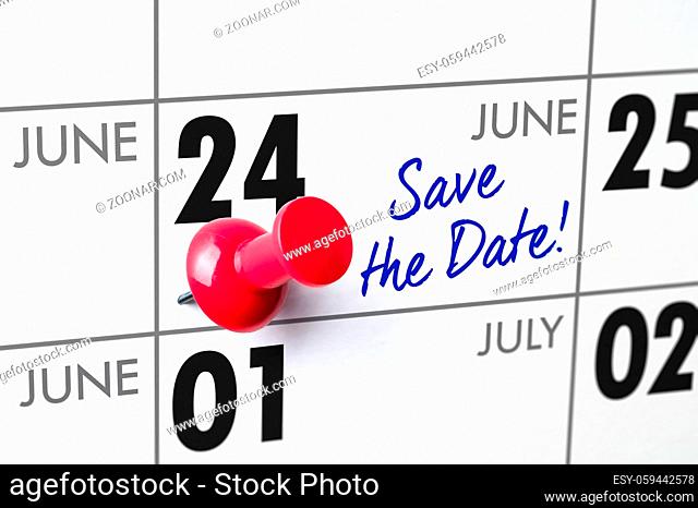 Wall calendar with a red pin - June 24