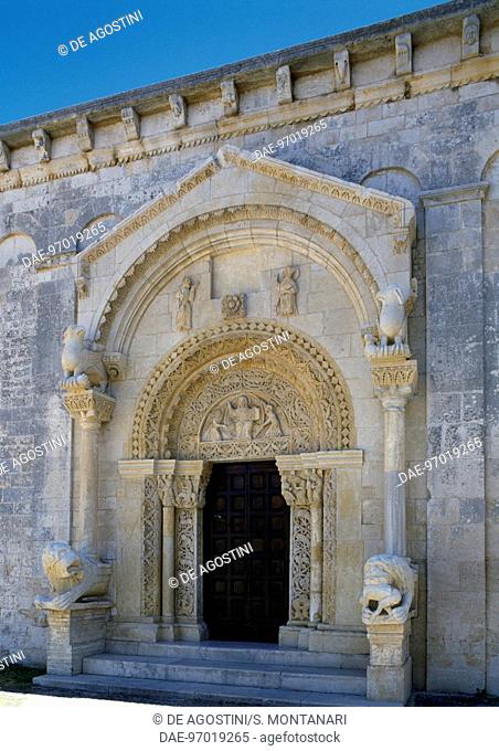 Entrance framed by a canopy resting on column-bearing lions, Abbey of St Leonard of Siponto (12th century), Manfredonia, Puglia, Italy