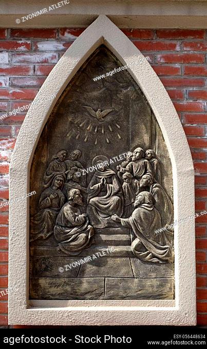 Pentecost, Descent of the Holy Spirit, the outer wall of the cathedral of St. Ignatius in Shanghai, China