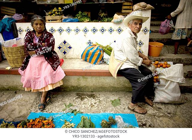 An elderly couple sell goods in the market Cuetzalan del Progreso, Mexico, February 17, 2008  Cuetzalan is a small picturesque market town nestled in the hills...