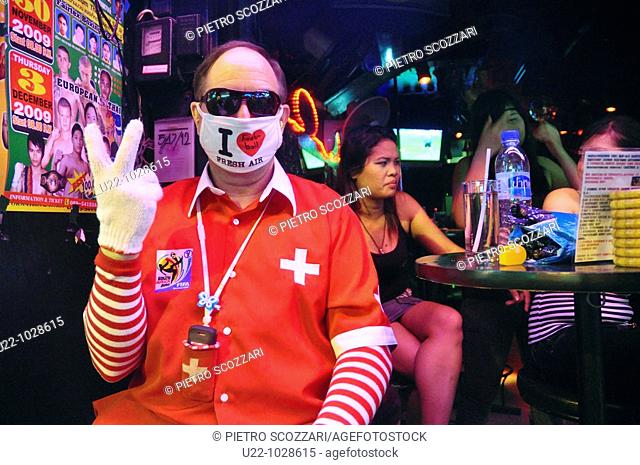 Pattaya (Thailand): weird tourist at a bar along the Walking Street