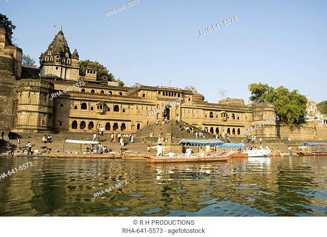 Shiva Hindu temple and Ahilya Fort Complex on banks of the Narmada River, Maheshwar, Madhya Pradesh state, India, Asia