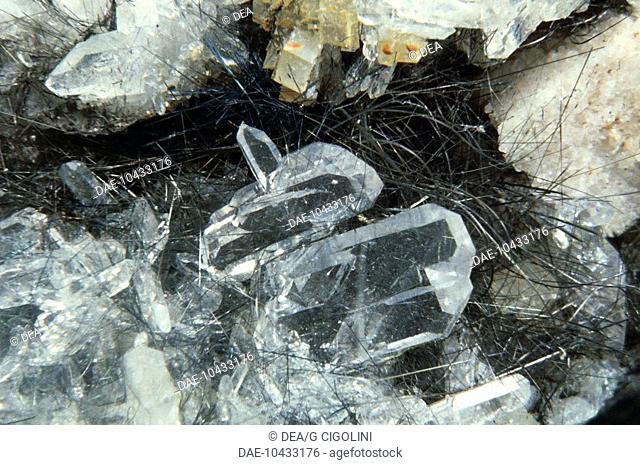 Minerals: Boulangerite (Lead Antimony Sulfide) and Quartz (Silicon Oxide)