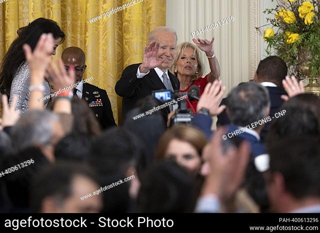 United States President Joe Biden and first lady Dr. Jill Biden depart the stage during a reception celebrating Nowruz at the White House in Washington, DC