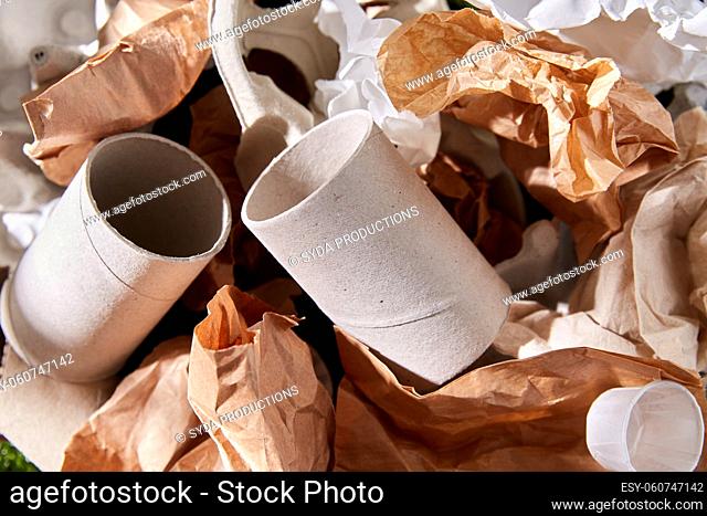 close up of crumpled paper waste on grass
