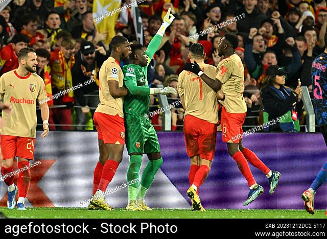goalkeeper Brice Samba (30) of RC Lens celebrates after stopping a penalty during the Uefa Champions League matchday 6 game in group B in the 2023-2024 season...