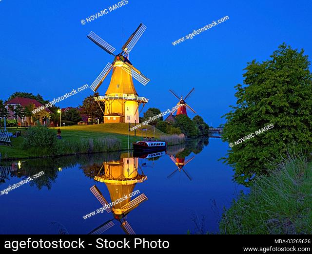 Twin windmills at the Siel in Greetsiel, East Frisia, Lower Saxony, Germany